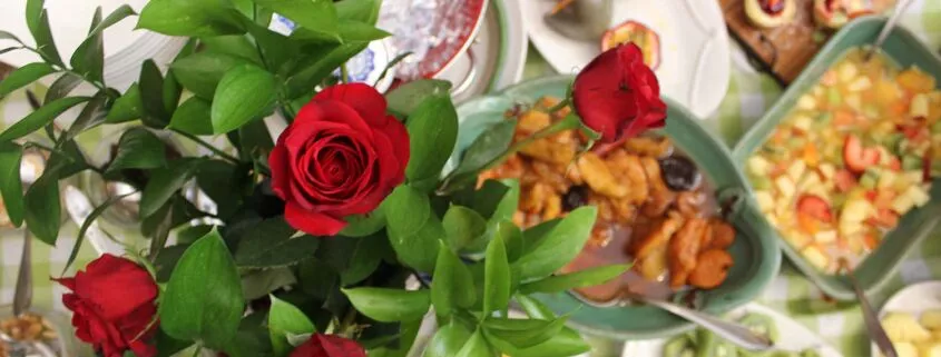 Roses and canapés on a celebration table